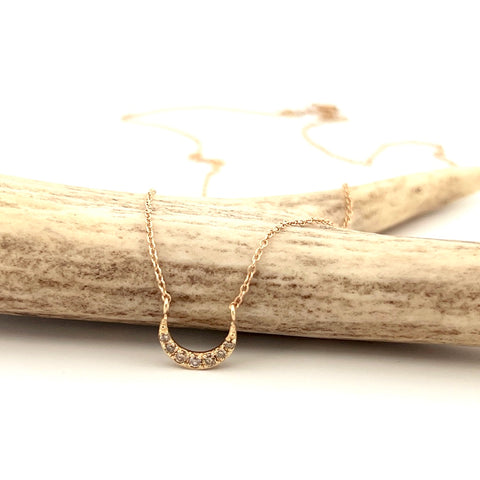 Gold and diamond crescent moon necklace Gold and diamond crescent moon necklace