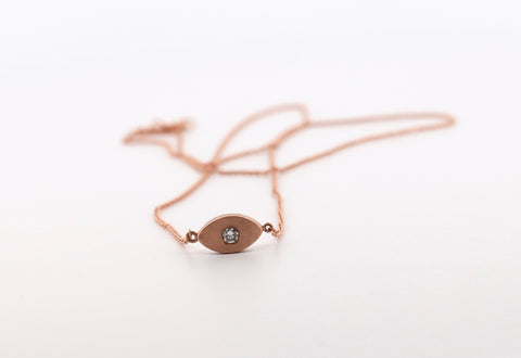 14k rose gold and diamond eye necklace