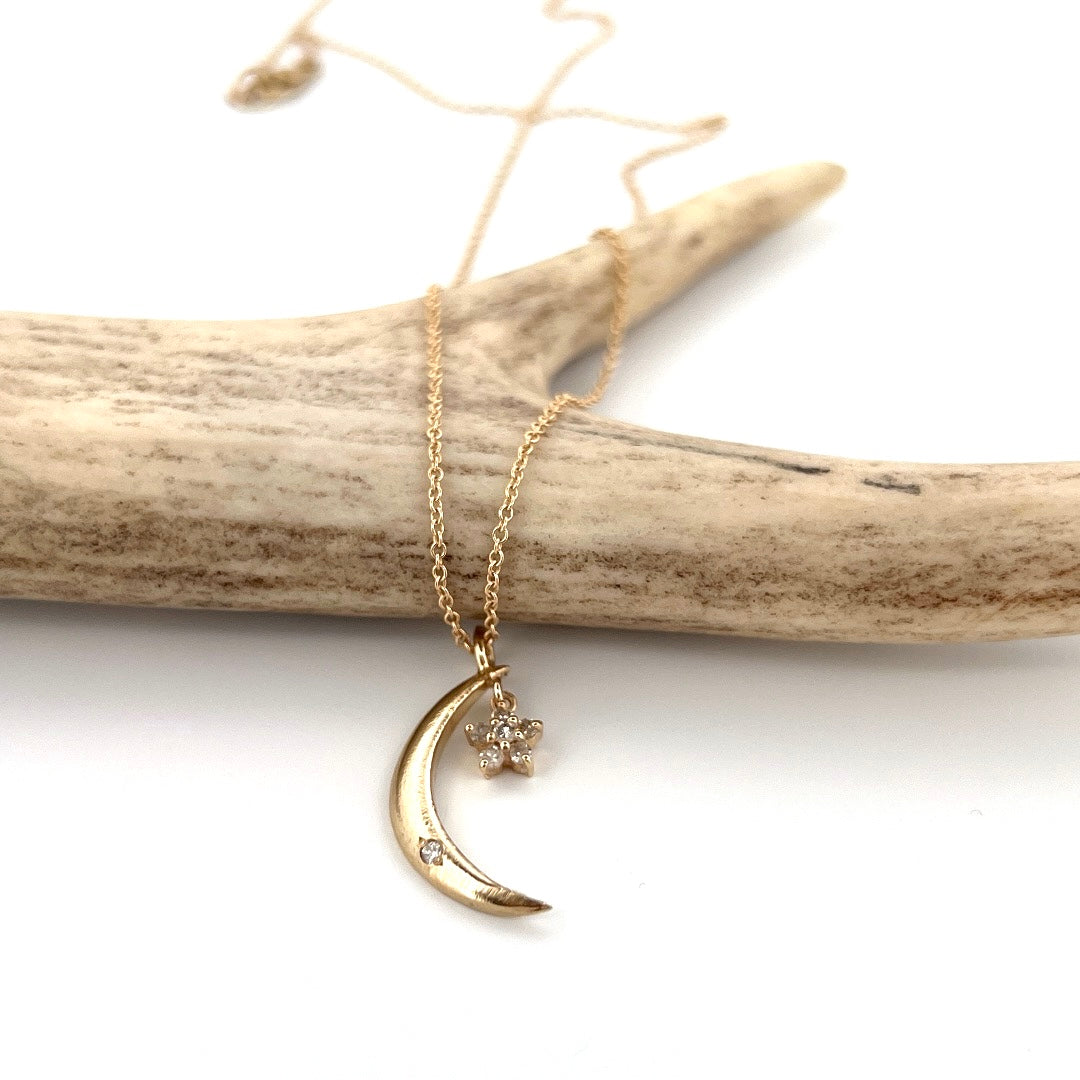 Gold moon and diamond star necklace