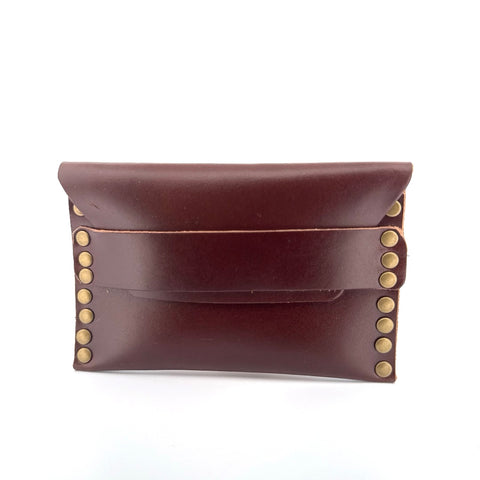 Brown leather studded pouch