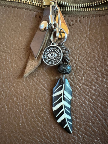 Wooden feather & eye disc bag charm